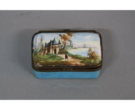A LATE 18TH CENTURY RECTANGULAR ENAMEL BOX, the hinged cover painted with a figure by a lake approaching a turreted building,