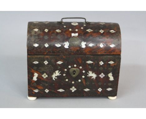 A VICTORIAN TORTOISESHELL, MOTHER OF PEARL INLAID AND METAL STUD WORK TEA CADDY, handle to the top, the mother of pearl of lo