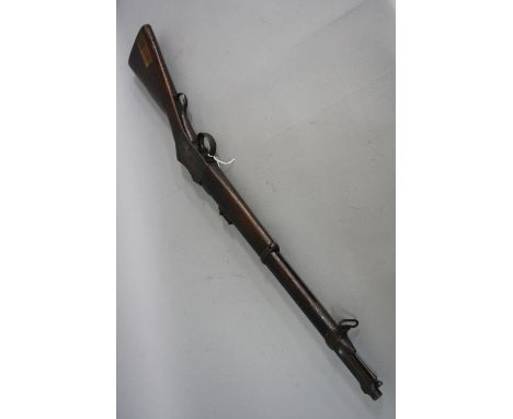 A .577'/.450'MARTINI-HENRY ARTILLERY CARBINE MK1, first approved for service on 21st July 1879, it is identified by its bayon