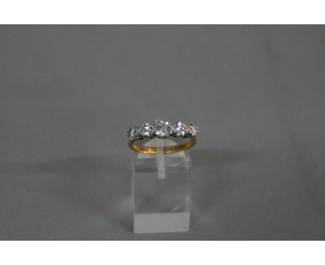 A MID 20TH CENTURY FIVE DIAMOND STONE HALF HOOP RING, estimated total modern round brilliant cut weight 1.10ct, colour assess