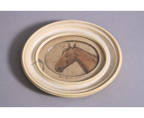 FOLLOWER OF SIR EDWIN LANDSEER, portrait of a brown horses head in side profile, a watercolour, paper torn and foxed, attribu