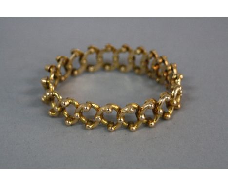 A VICTORIAN 15CT GOLD 'BADEN' PATENT EXPANDING BRACELET, composed of woven links, stamped '15', approximate gross weight 16.1