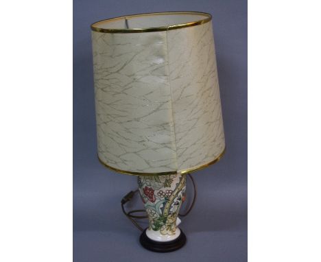 A MOORCROFT POTTERY WILLIAM MORRIS GOLDEN LILY PATTERN TABLE LAMP, of baluster form, mounted on a circular wooden base, with 