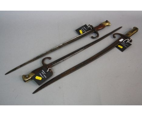 A FRENCH 1872 PATTERN CHASSEPOT RIFLE BAYONET, markings to hilt but faint, together with a French 1879 Gras bayonet, marked R