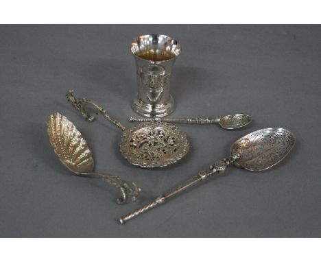AN EDWARDIAN SILVER ANNOINTING SPOON, Celtic style decoration, together with another smaller example, both makers Elkington &