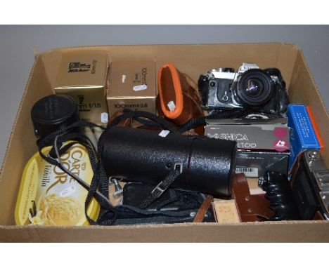 A TRAY OF CAMERA EQUIPMENT, including a Nikon FM in case fitted with a Tamron 35-70 1:3.5 lens, a Nikkor 50mm 1:1.8 lens (box