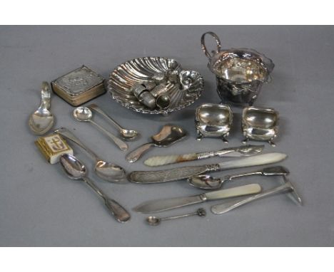 A PARCEL OF SILVER AND PLATE, to include two Victorian mother of pearl handled butter knives, a miniature book of Common Pray