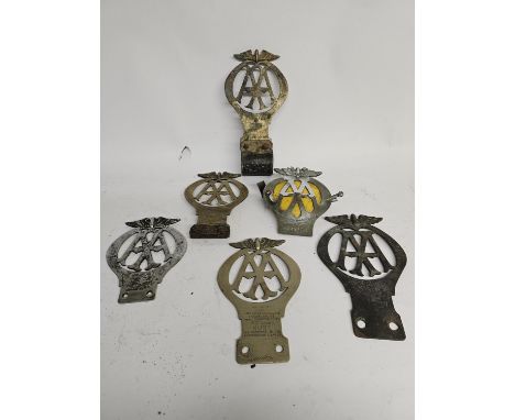Six Vintage Metal 'AA' badges 