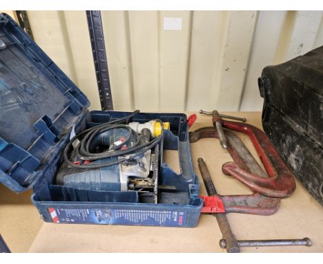Collection of tools to include - Makita Router 110v , a Bosch Jigsaw 110V,  A Skilsaw 100V 1350 Watt electric saw, Two D clam