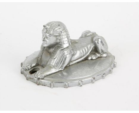 Vintage Egyptian Mascot - Armstrong Siddeley Sphinx car mascot from the 1930s on a oval radiator cap - base is 11x9cm, 7cm hi