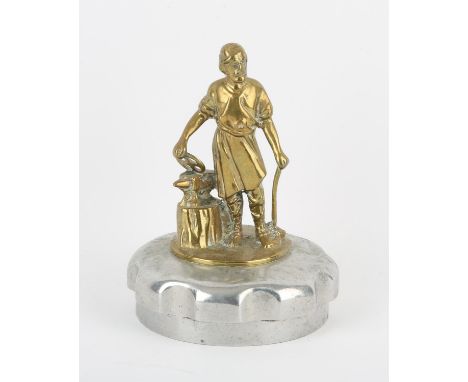Vulcan - An Early 20th Century Brass Blacksmith Radiator Car Mascot, mounted on a large circular Chrome radiator cap. 16cm Hi