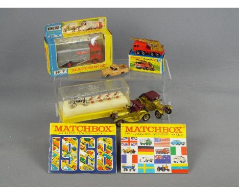 Matchbox - A small group of boxed and unboxed Matchbox vehicles in various scales, and two Matchbox catalogues. Lot includes,