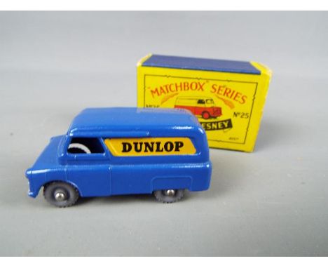 Matchbox, a Moko Lesney Product - Dunlop Van, blue body, grey plastic wheels with rounded axles # 25, mint in original box