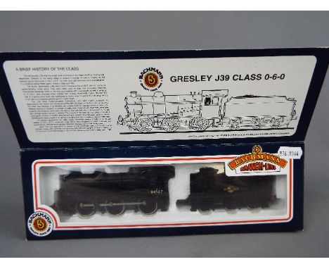 Bachmann - an OO gauge locomotive and tender BR black livery op no 64967, late crest # 31-852, appears ex in window box