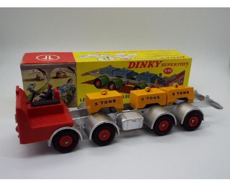 Dinky Toys - A boxed Dinky Toys #936 Leyland 8 Wheeled Chassis. The chassis is in red, with red plastic hubs, and comes with 