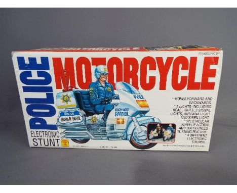 Min Yin - A vintage boxed plastic Police Electronic Stunt Motorcycle by Min Yin Toys . The item appears to be in Mint conditi