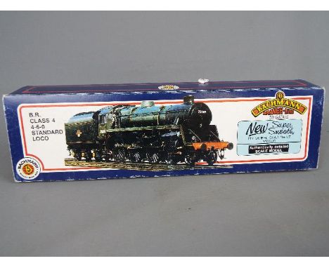 Bachmann - an OO gauge locomotive BR class 4 4-6-0 standard, green livery, op no 75029 with tender # 31-103, boxed, appears e