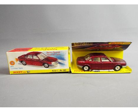 Dinky Toys - A boxed Dinky Toys #176 NSU Ro 80. The model in metallic red, with white interior and chrome spun hubs. The mode