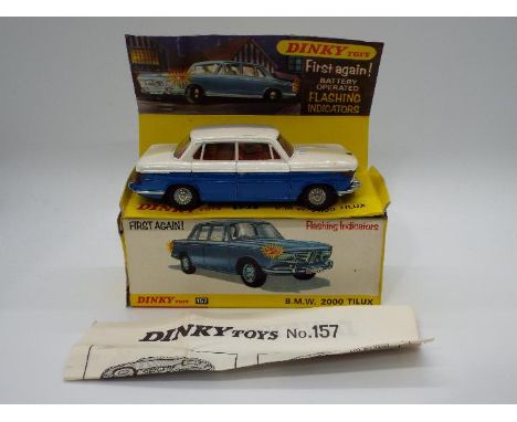 Dinky Toys - A boxed Dinky Toys #157 BMW 2000 Tilux. The battery operated model in two tone body (white upper and blue lower)