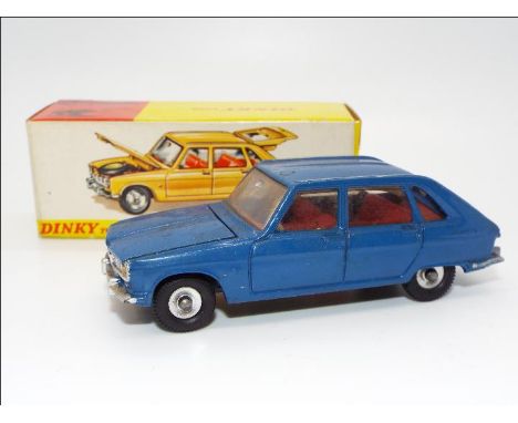 Dinky Toys - A boxed Dinky Toys #166 Renault R16. The model is finished in blue with a red interior, has spun hubs, together 