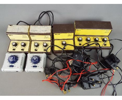 Model Railways - a box of six modern power controllers, Gaugemaster and Bachmann