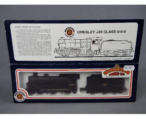 Bachmann - an OO gauge locomotive and tender BR black livery op no 64967, late crest # 31-852, appears ex in window box
