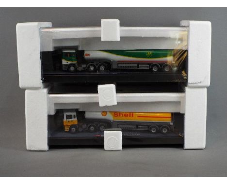Corgi - A boxed pair of Corgi 1:50 scale 'Modern Trucks'. Lot contains ##75103 ERF Tanker - BP; and #75102 ERF Tanker - Shell