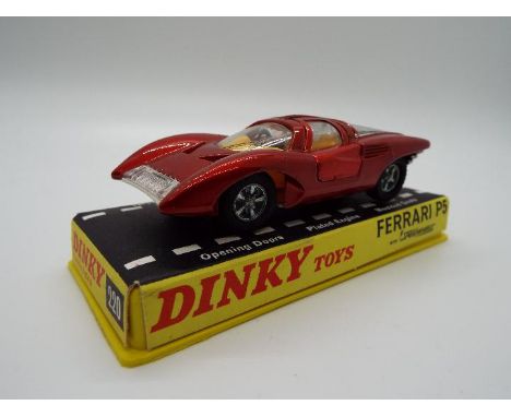 Dinky Toys - A boxed Dinky Toys #220 Ferrari P5. The model in metallic red with yellow interior and silver trim appears to be