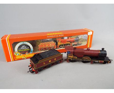Model Railways - Hornby OO gauge locomotive and tender LMS class 4P, 4-4-0 compound with smoke, maroon livery, appears nm in 