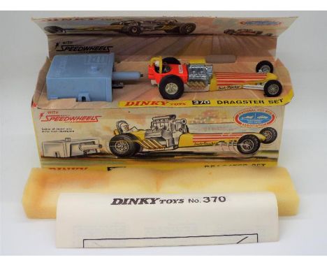 Dinky Toys - A boxed Dinky Toys #370 Dragster Set. The model is finished in fluorescent orange body with 'Fireball' label, a 