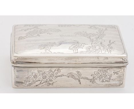 A Japanese silver cigarette box, c1930, engraved with cranes and prunus, the lid with inscription and HONG KONG 1931, 15.5cm 