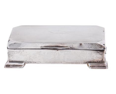 A George V silver cigarette box, the lid engine turned, cedar lined, 15.5cm l, by Harman Brothers, Birmingham 1932  Dents and