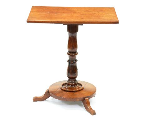 A Victorian mahogany lamp table,&nbsp; the associated top on turned pillar with lotus calyx, round base and three feet, 66cm 