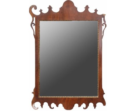 A walnut fretted frame mirror, late 19th c, 83cm h, a portrait drawing of Edward E Lawson (b.1894) by R F Thatcher, signed an