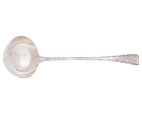 A Victorian silver soup ladle,&nbsp;Beaded Old English pattern, crested, by Aldwinckle &amp; Slater, London 1886, 5ozs 14dwts