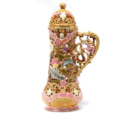 A Zsolnay reticulated flagon and cover, late 19th c,&nbsp;decorated with a profusion of stylised pink and white flowers and s