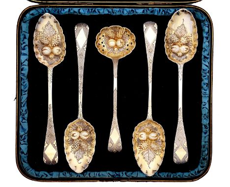 Four silver tablespoons and a sauce ladle, George III-Victorian, later chased and gilt as a 'set' of berry spoons and sugar s