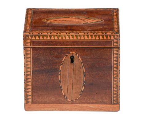 A George III mahogany and inlaid tea caddy, with shell patera and geometric borders, 10.5cm l  Cosmetic restoration and re-po