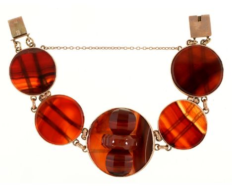 A gold and agate bracelet,&nbsp; 16cm, marked 9ct, 56g  Light scratches from normal wear and consistent with age
