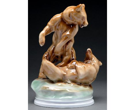 A Zsolnay porcelain group of brown bears, mid 20th c, 29.5cm h, green printed mark  Good condition
