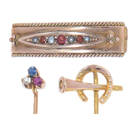 An Edwardian 9ct gold scarf clip and two stickpins, gem set or otherwise, 5.7g  Scarf clip dented on reverse. Pins in good co