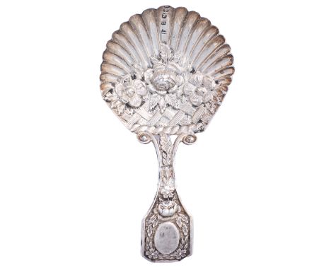 A George III silver caddy spoon, the die stamped shell shaped bowl with flowers and basket work, 81mm l, by Matthew Linwood, 