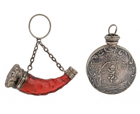 A Victorian silver mounted ruby flashed and cut glass horn shaped scent bottle, 50mm l and a Continental silver round scent f