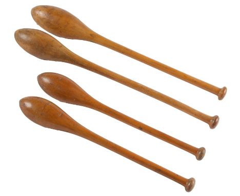 Two pairs of varnished light wood exercise clubs, early 20th c, 38 and 49cm l  In typical country house condition with minor 