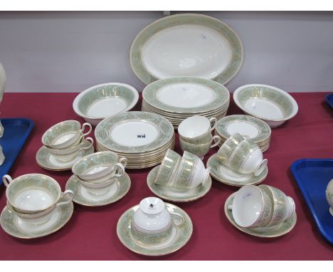 A Wedgwood 'Gold Columbia' (sage green) Porcelain Part Tea and Dinner Service, printed marks, comprising; oval platter 38cm l