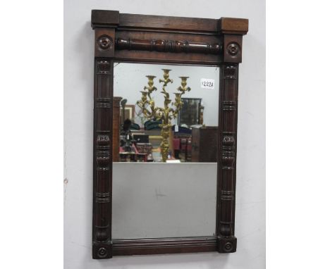 A Mid XIX Century Mahogany Framed Mirror, of rectangular architectural form with turned columns and roundels. 53 x 33cm.