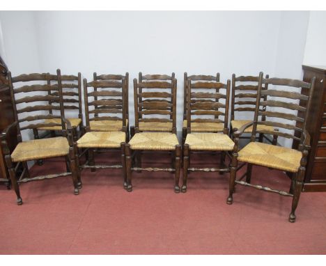 A Set of Ten Early XIX Century Style Ladder Back Chairs, (two carver and eight single) with rush seats on turned legs with pa