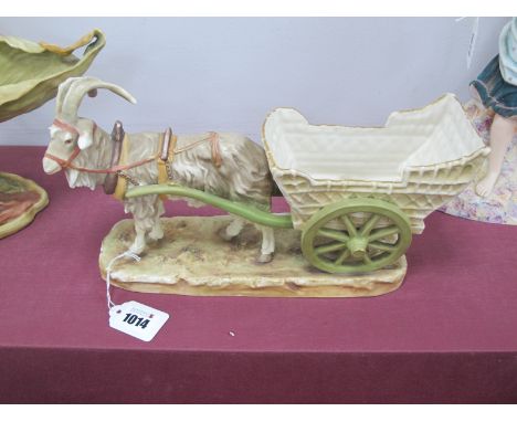 A Royal Dux Pottery Model of a Goat Pulling a Cart, upon a rocky rectangular base, pink triangle mark, impressed 951, 32cm lo