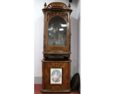 A Walnut Cased Cabinet Polyphon, with a coin operated mechanism playing 50cm discs, the case with shaped cresting over a serp