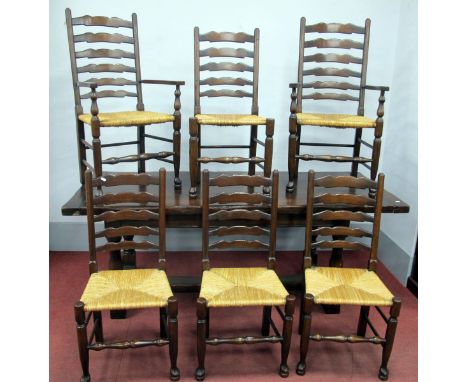 A XVII Century Style Oak Refectory Table, the top with baton ends raised on turned and block supports united by 'H' stretcher